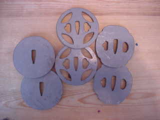 Laser cut steel tsuba
                    blanks